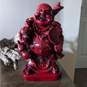 8 1/2 inch tall red resin buddha statue